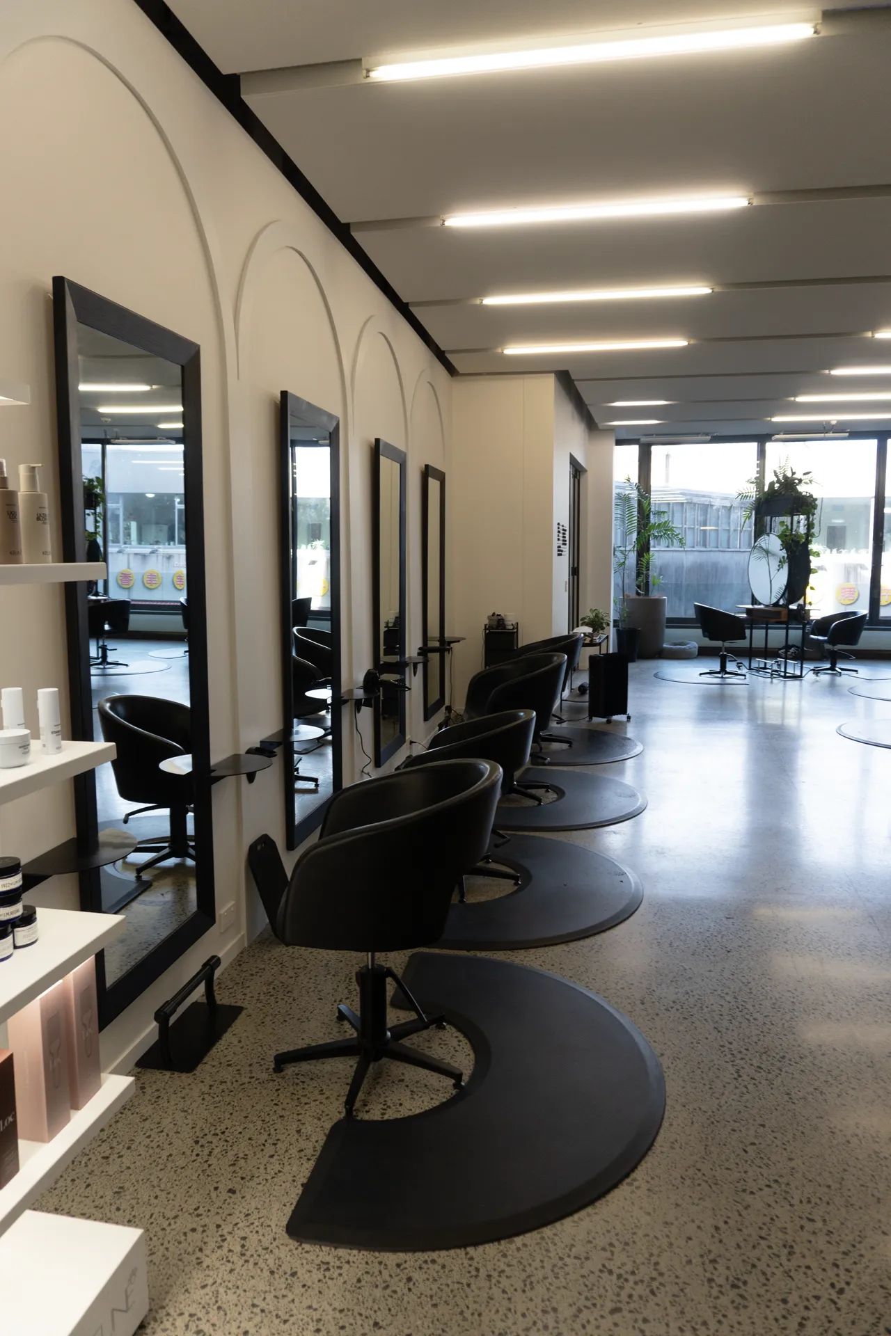 Styling stations receding down the studio floor