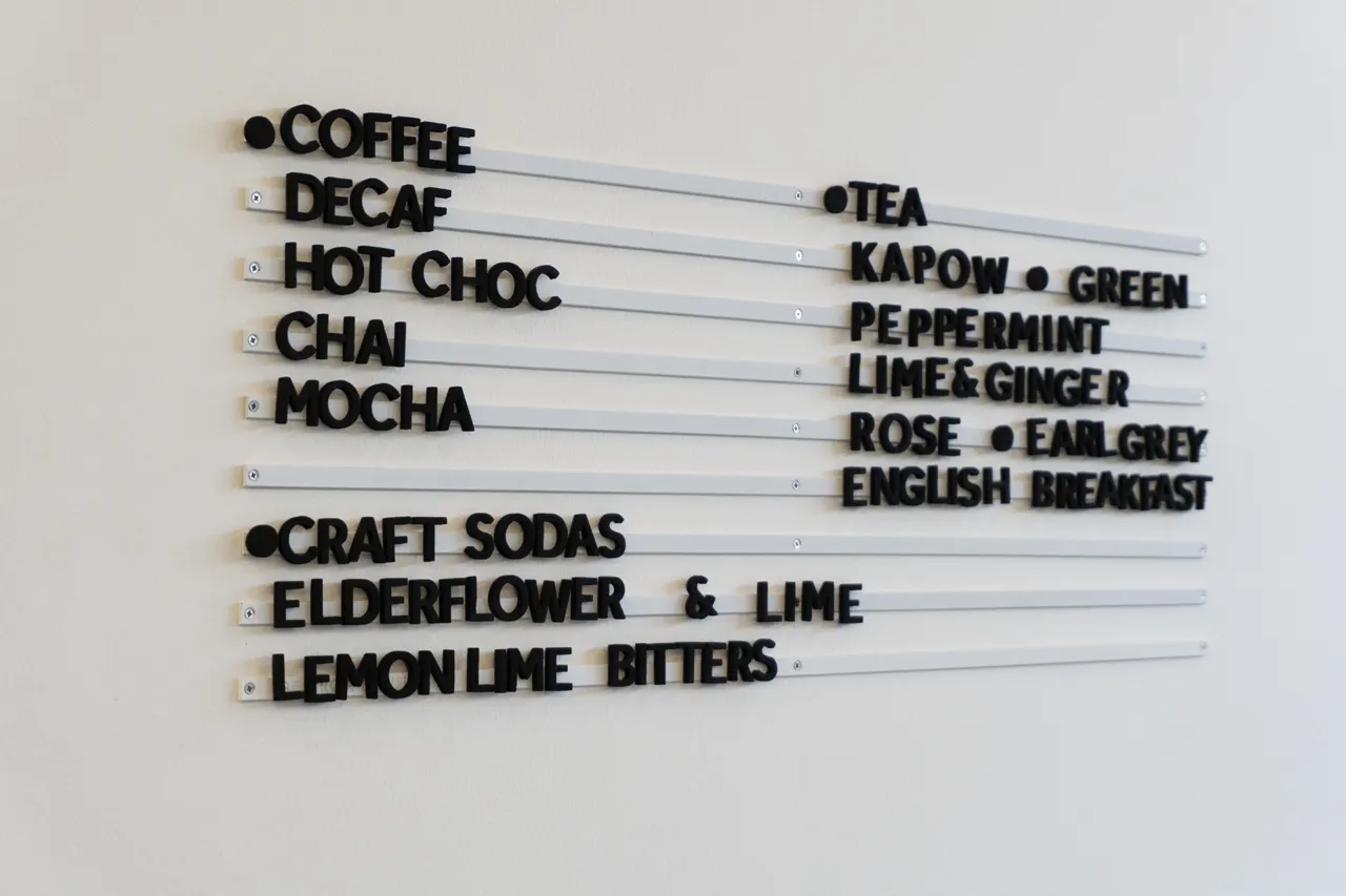 The studio coffee and tea menu board