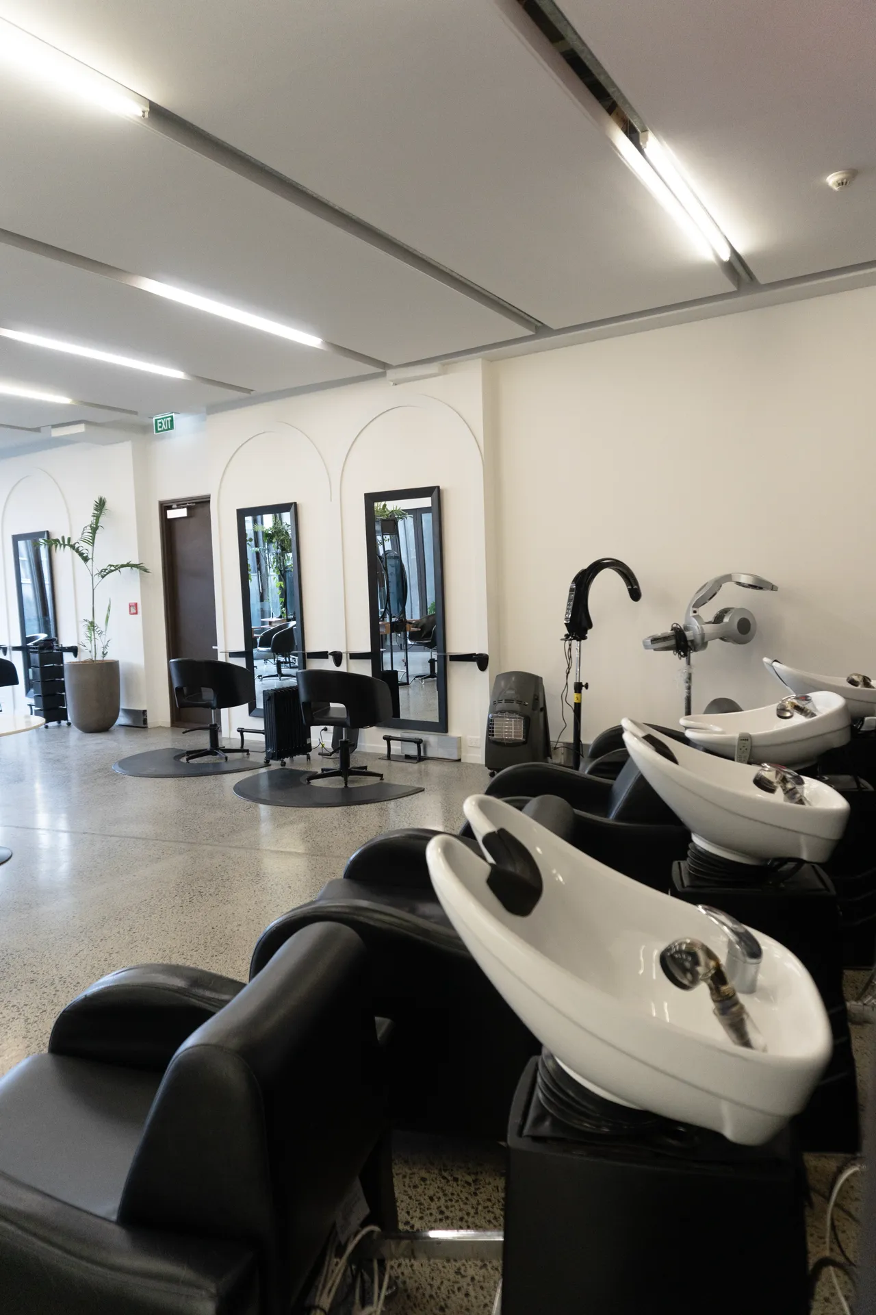 Wash basins by the arched feature wall